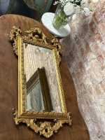 Antique rococo style gilt wall mirror with bevelled glass