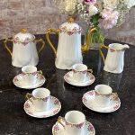 Limoges France porcelain coffee service with pink roses and gilt Art Deco border