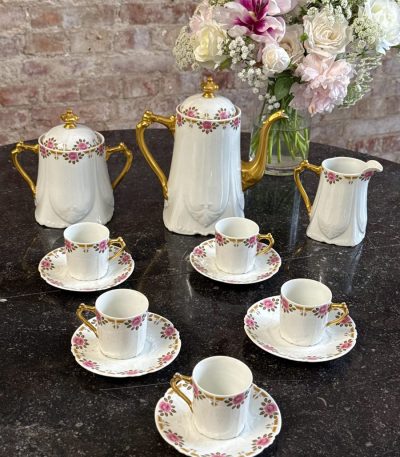 Limoges France porcelain coffee service with pink roses and gilt Art Deco border