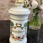 Vieux Paris porcelain apothecary jar Aconitum with palm tree motif