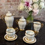 Gilt porcelain coffee service Les Perles by Manufacture de Couleuvre