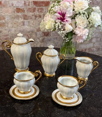 Gilt porcelain coffee service Les Perles by Manufacture de Couleuvre