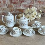 antique porcelain tea and coffee set with wildflower pattern for five persons