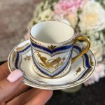 Antique Limoges porcelain coffee cup and saucer with cobalt blue borders and gold gilt motifs