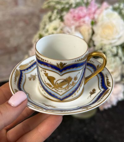 Antique Limoges porcelain coffee cup and saucer with cobalt blue borders and gold gilt motifs