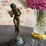 Woman's figure with stone base, heavy, small size (7134)