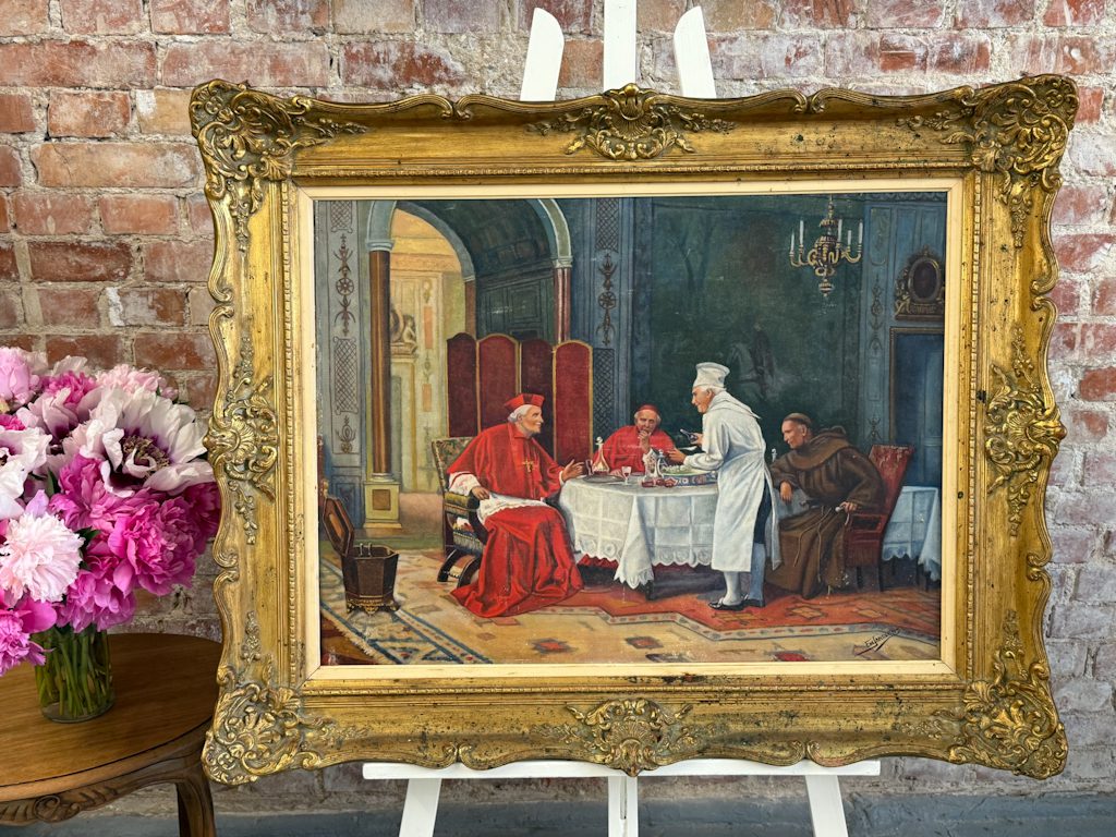 Late 19th-century clerical genre painting by Em. Janssens in an ornate gilded frame