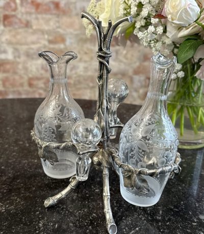 Antique glass cruet set with Britannia metal stand in art nouveau style