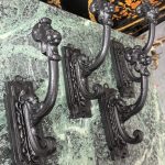 antique cast iron curtain holders