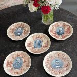 five antique faience plates with historical French portraits from Sarreguemines