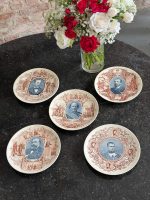 five antique faience plates with historical French portraits from Sarreguemines