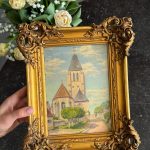 maza izmēra glezna ar baznīcu, zelta krāsas rāmī (6558)