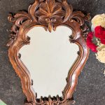 carved wooden wall mirror in rococo style signed grauby