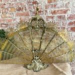 Antique folding bronze fan screen in peacock form with pierced blades