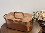 antique copper covered pan