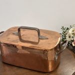 antique copper covered pan