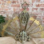 Antique folding gilt-bronze peacock firescreen with pierced fan blades