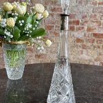 Antique conical crystal decanter with 800 silver collar in Art Deco style