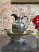 Antique silver plated pitcher and wash basin set by Reed and Barton