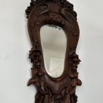antique oak wall mirror with floral carvings
