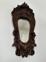 antique oak wall mirror with floral carvings