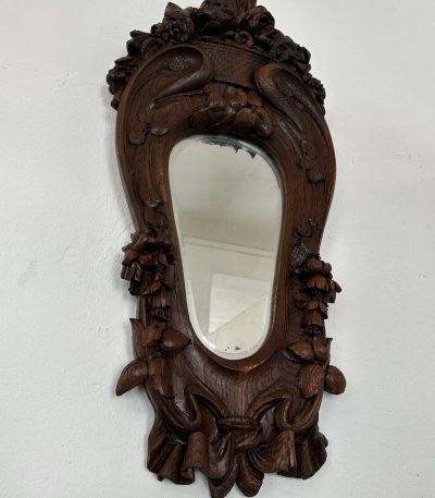 antique oak wall mirror with floral carvings