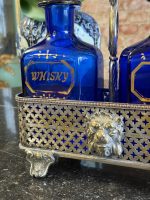 Antīks dzērienu karafeļu komplekts apsudrabotā statīvā ar lauvas galvām un ķepām (Antique decanter set in a silver-plated stand) (6404) - Image 12
