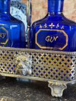Antīks dzērienu karafeļu komplekts apsudrabotā statīvā ar lauvas galvām un ķepām (Antique decanter set in a silver-plated stand) (6404) - Image 8