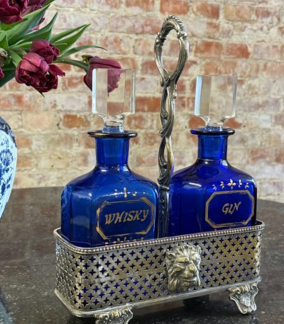 antique cobalt blue glass whisky gin decanter set in silver plated lion head stand