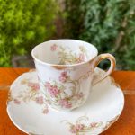 Porcelāna krūzīte ar šķīvīti, "Limoge", ziedu raksts, maza izmēra (2613)