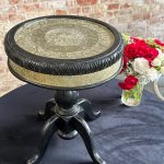 Small black moorish side table with embossed silver metal top