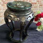 Japanese style black side table with glass top and gold painted motifs