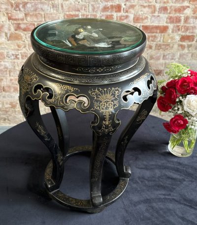 Japanese style black side table with glass top and gold painted motifs
