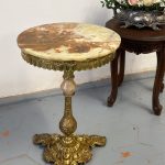 Onyx table small gueridon with gilt bronze base and female mask figures