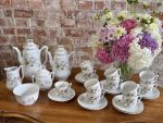 antique porcelain tea set with floral pattern