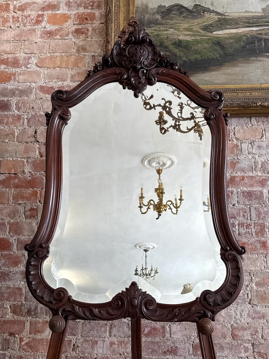 carved rosewood mirror with monogram crest