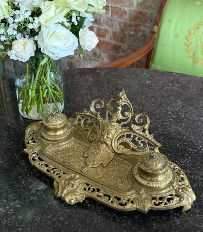 Antique brass inkstand with double inkwells and neorenesanse mascaron