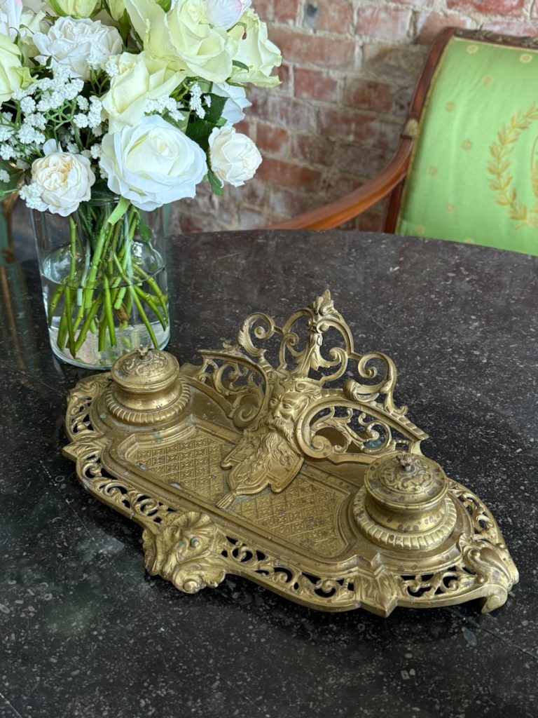 Antique brass inkstand with double inkwells and neorenesanse mascaron